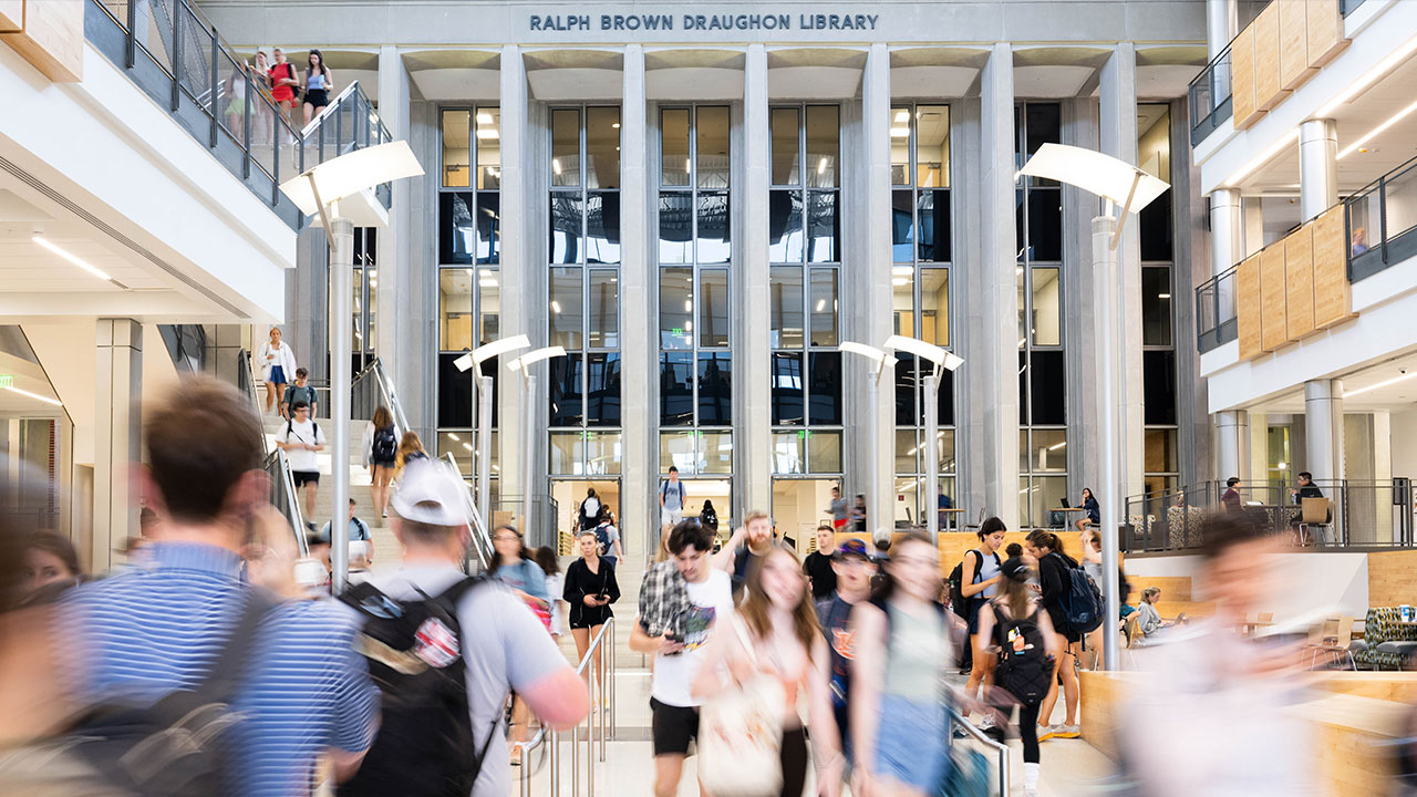 Shot of students walking in front of RBD Library