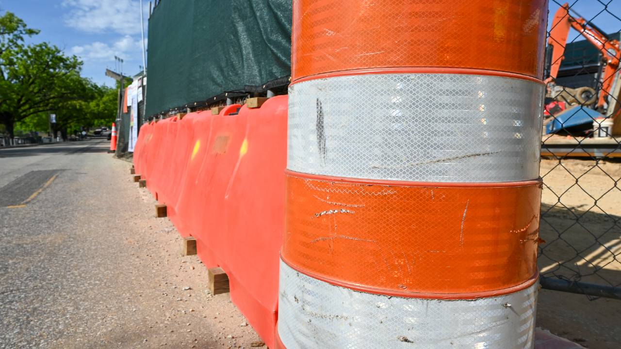 Construction barrels on South Donahue Drive