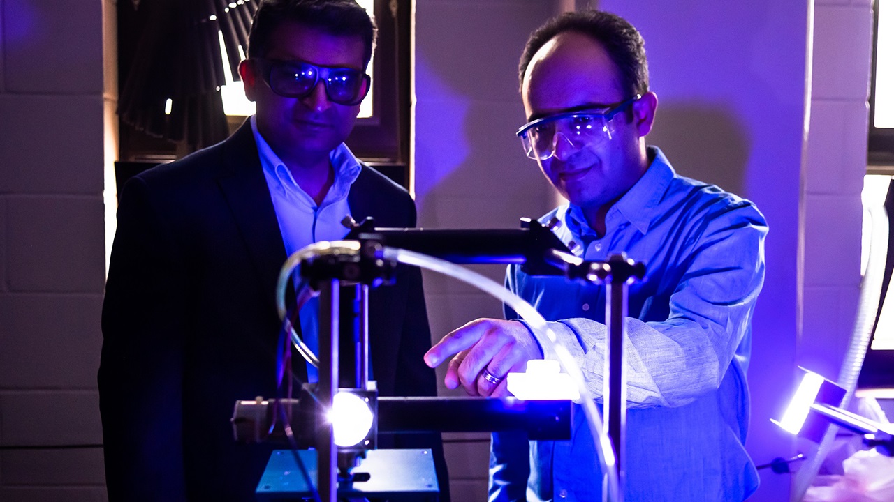 Nema Shamsaei and Masoud Mahjouri-Samani in advanced manufacturing laboratory