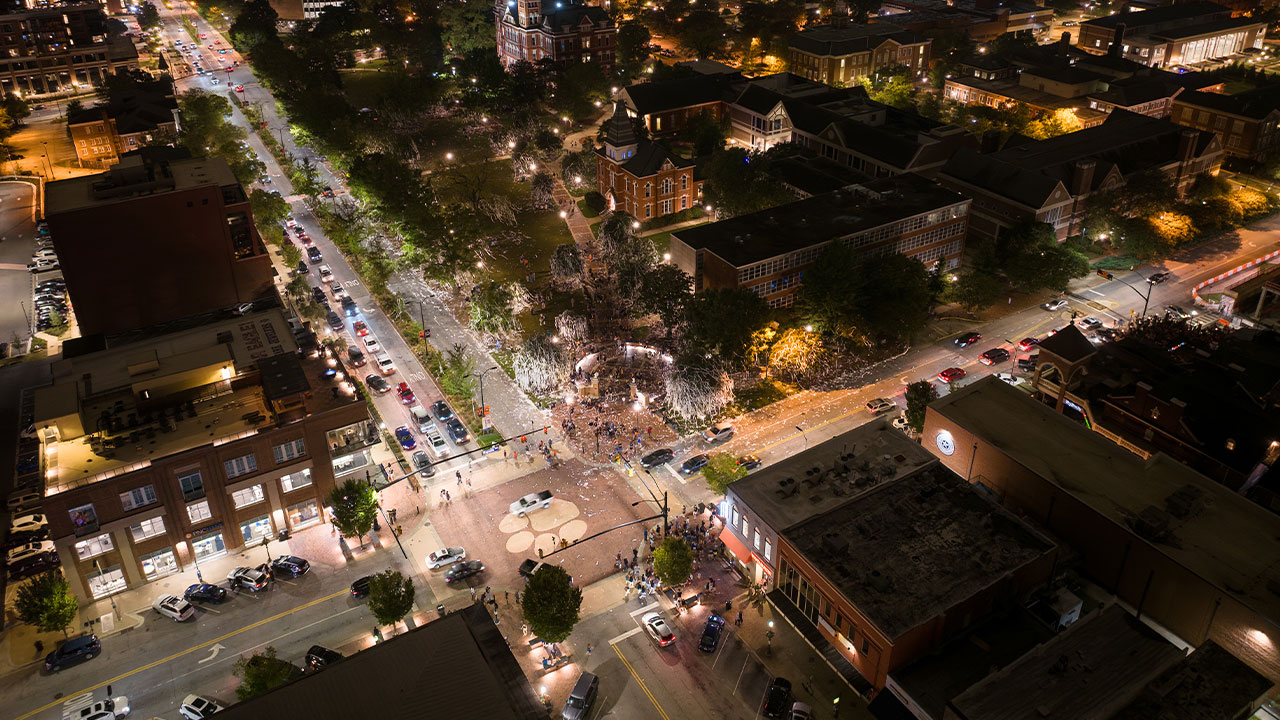 A drone shot of the intersection of College Street and Magnolia Avenue in downtown Auburn, Alabama.