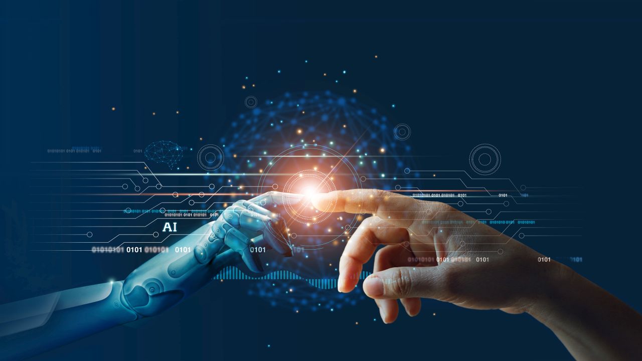 a robotic finger touching a human finger