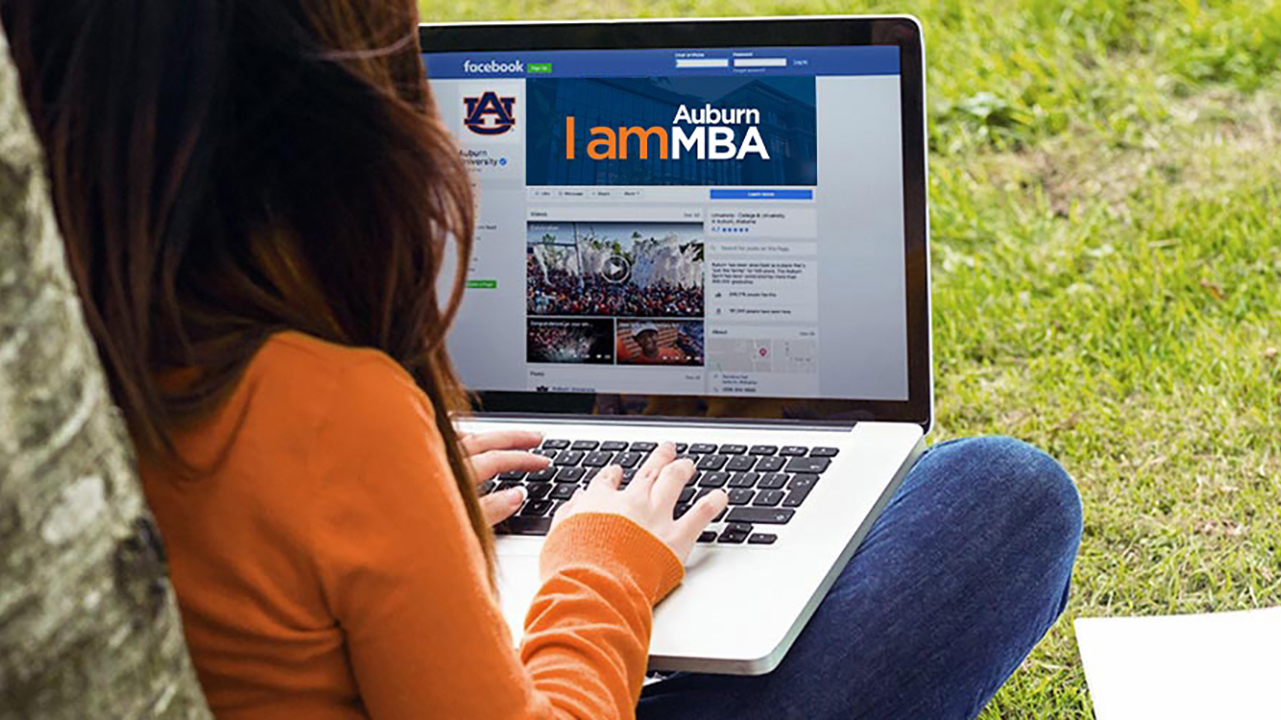 Online MBA image of student on laptop