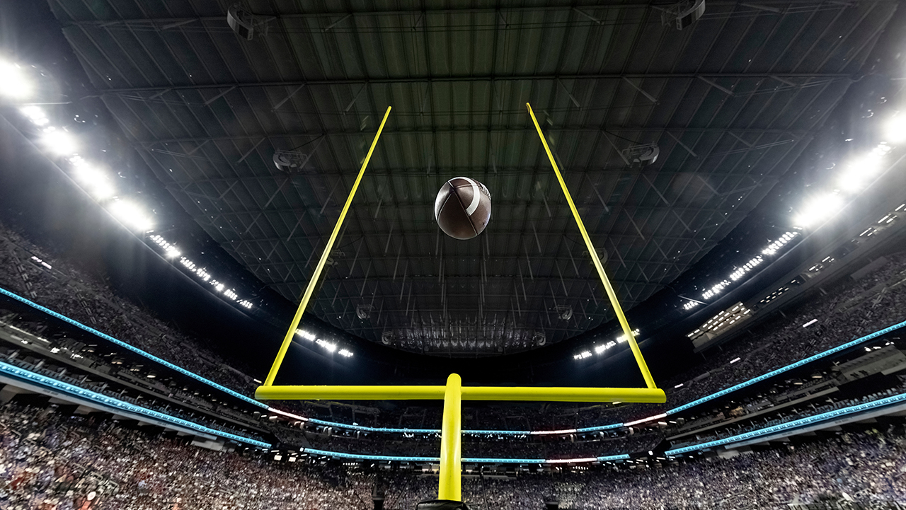 Brocreative-adobe-stock-photo-football-through-goalposts