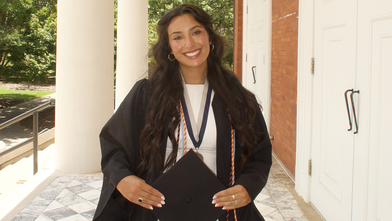 Woman student in cap and gown
