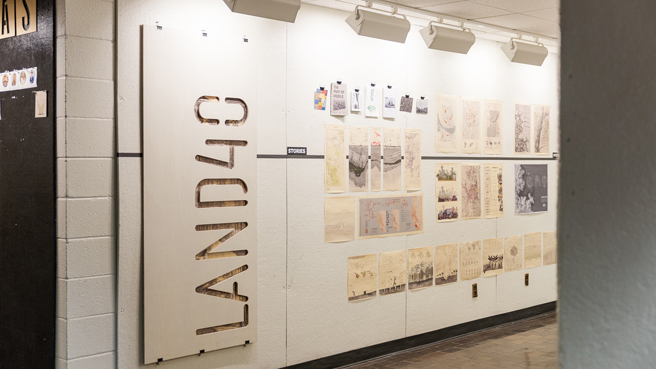 LAND40 exhibition with student work pinnned up