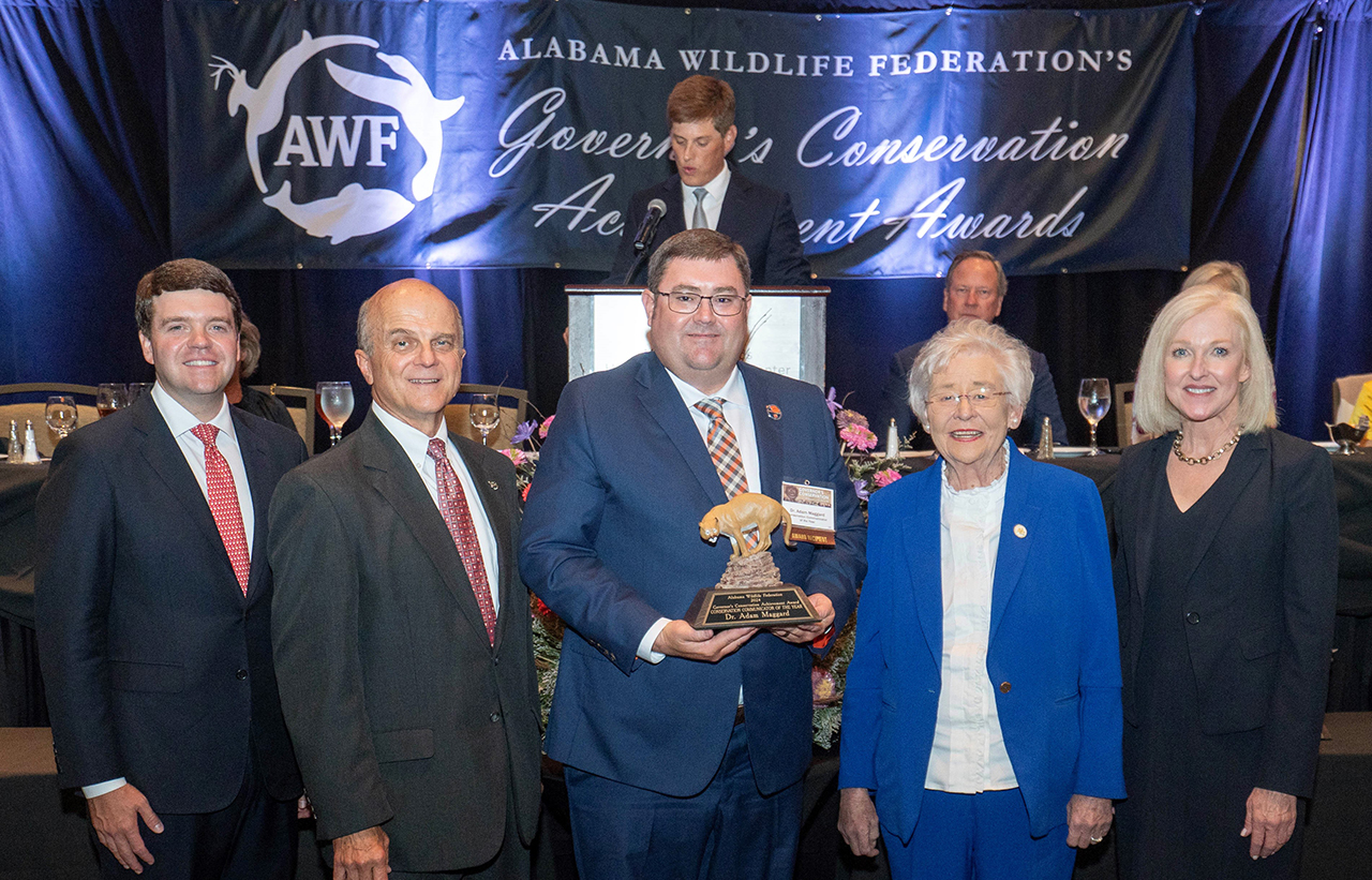 Shown after the awards presentation are from left to right, Taylor Williams with PowerSouth Energy, AWF President Steve Forehand, Adam Maggard, Gov. Kay Ivey and Susan Comensky with Alabama Power Company. Photo Credit: Hal Yeager, Governor’s Press Office.