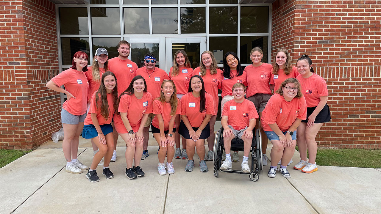 Auburn students at therapeutic camp.
