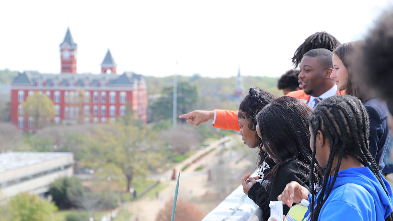 LEAD participants look out over campus from the top of the Haley Center
