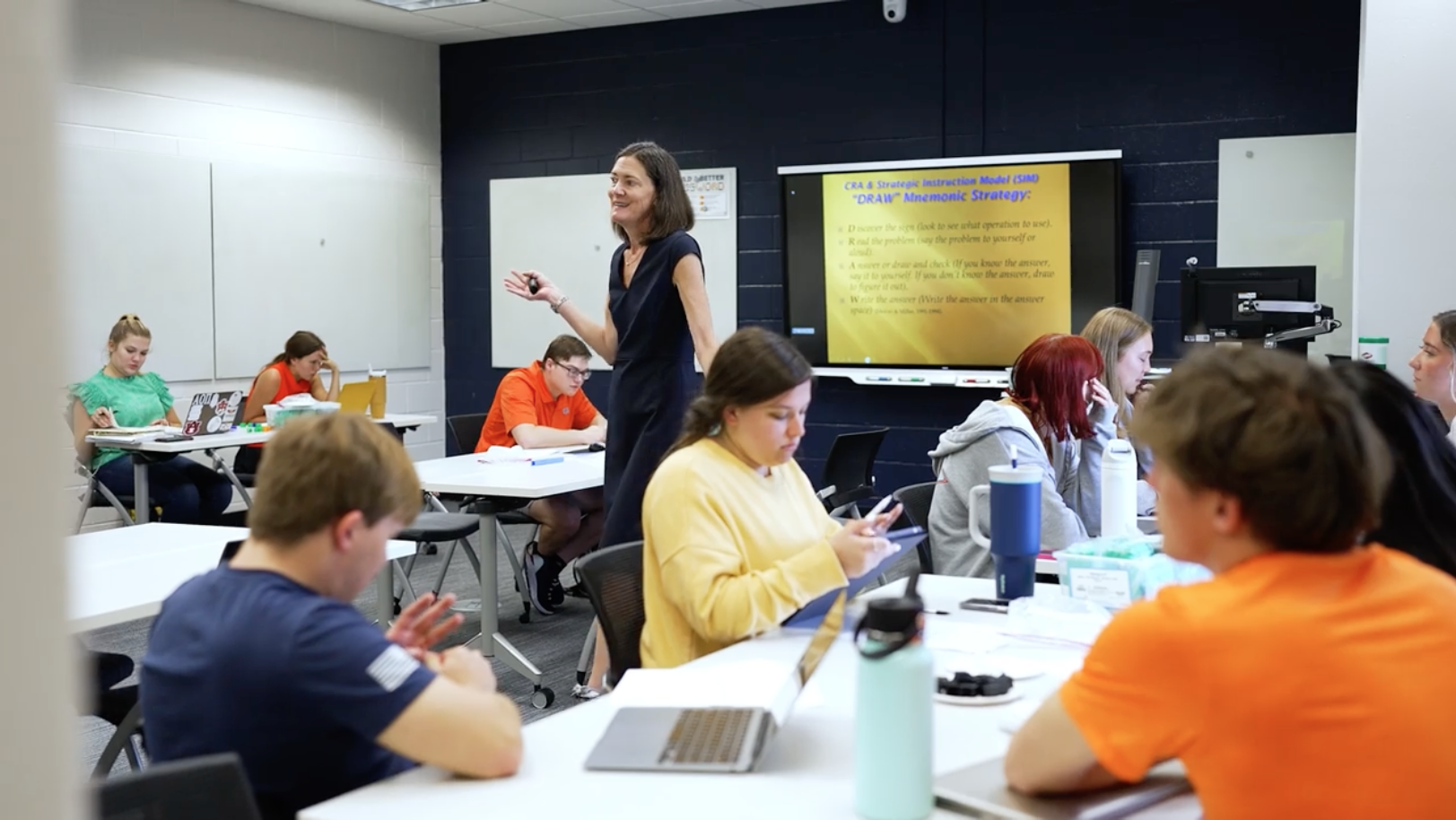 Margaret Flores teaching a class