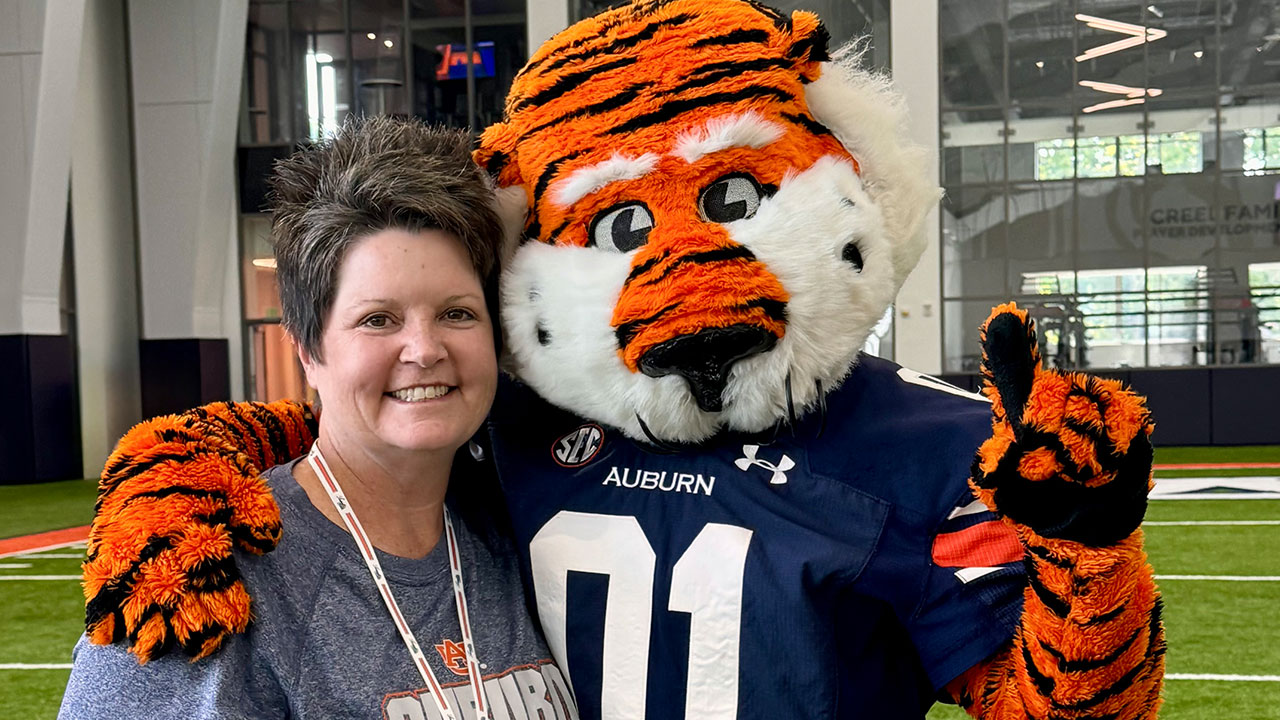 Amy Baker is pictured with Auburn