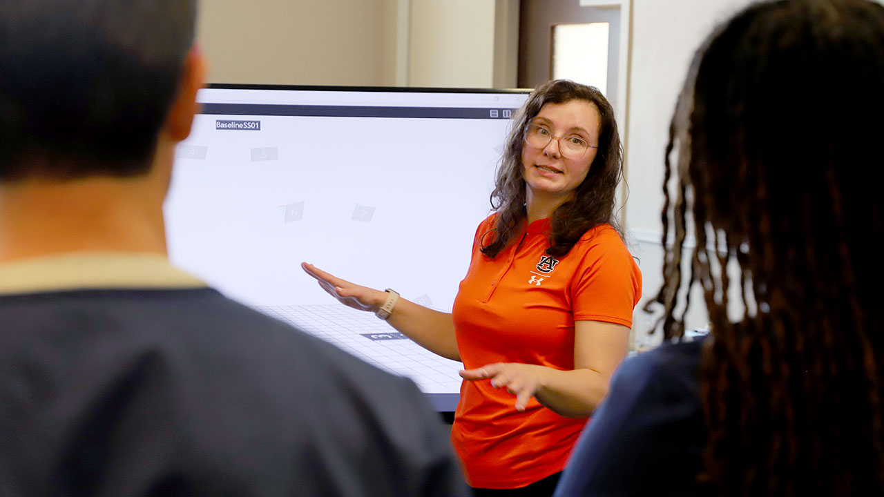 Jaimie Roper is pictured talking inside one of her labs.