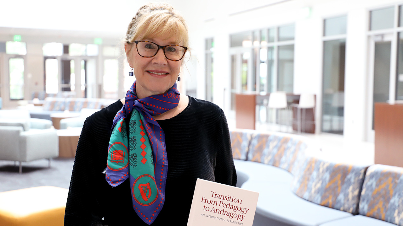 Leslie Cordie holding her book