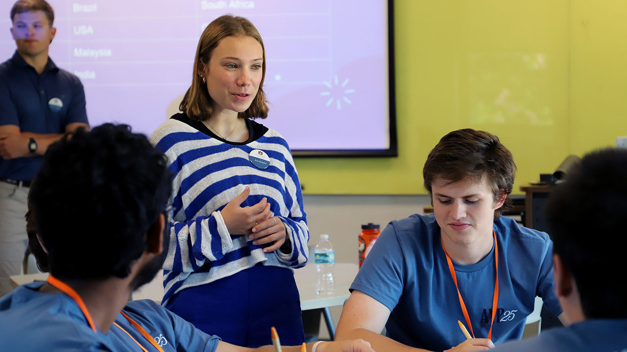 A student teacher working with campers