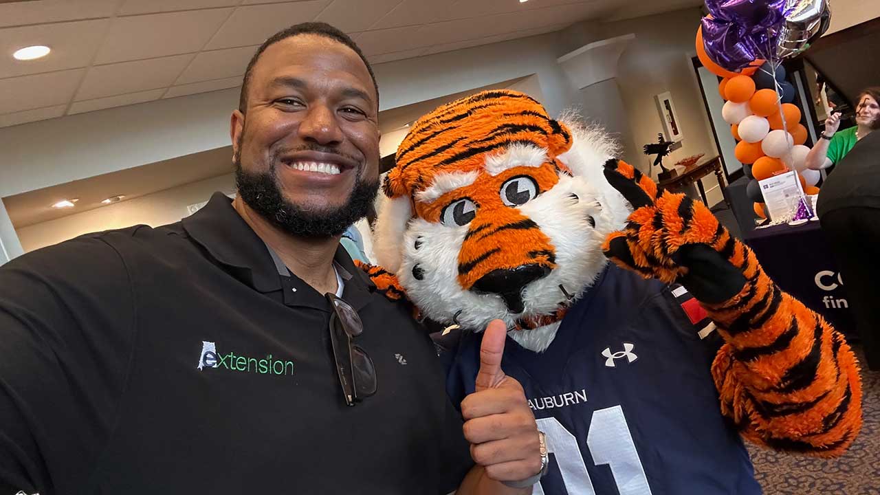 Daniel Sullen poses with Aubie