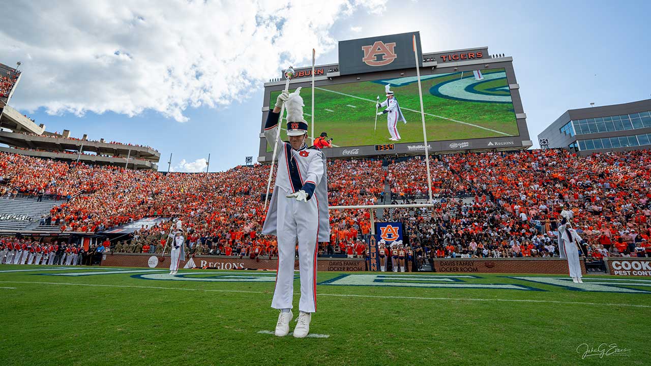 Ross Tolbert performing on the field as drum major