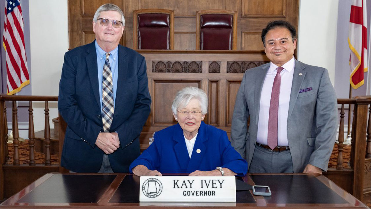 Mike Phillips, Kay Ivey and Majed Dweik