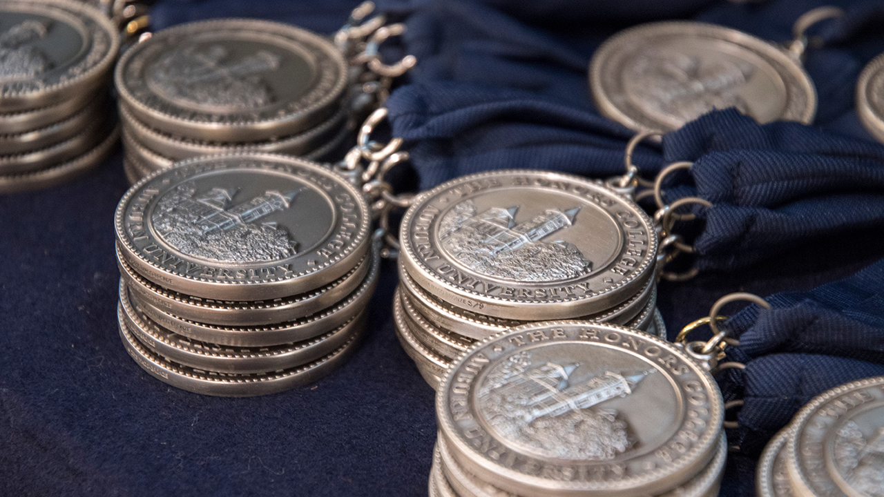 image of Honors College medals with blue ribbons