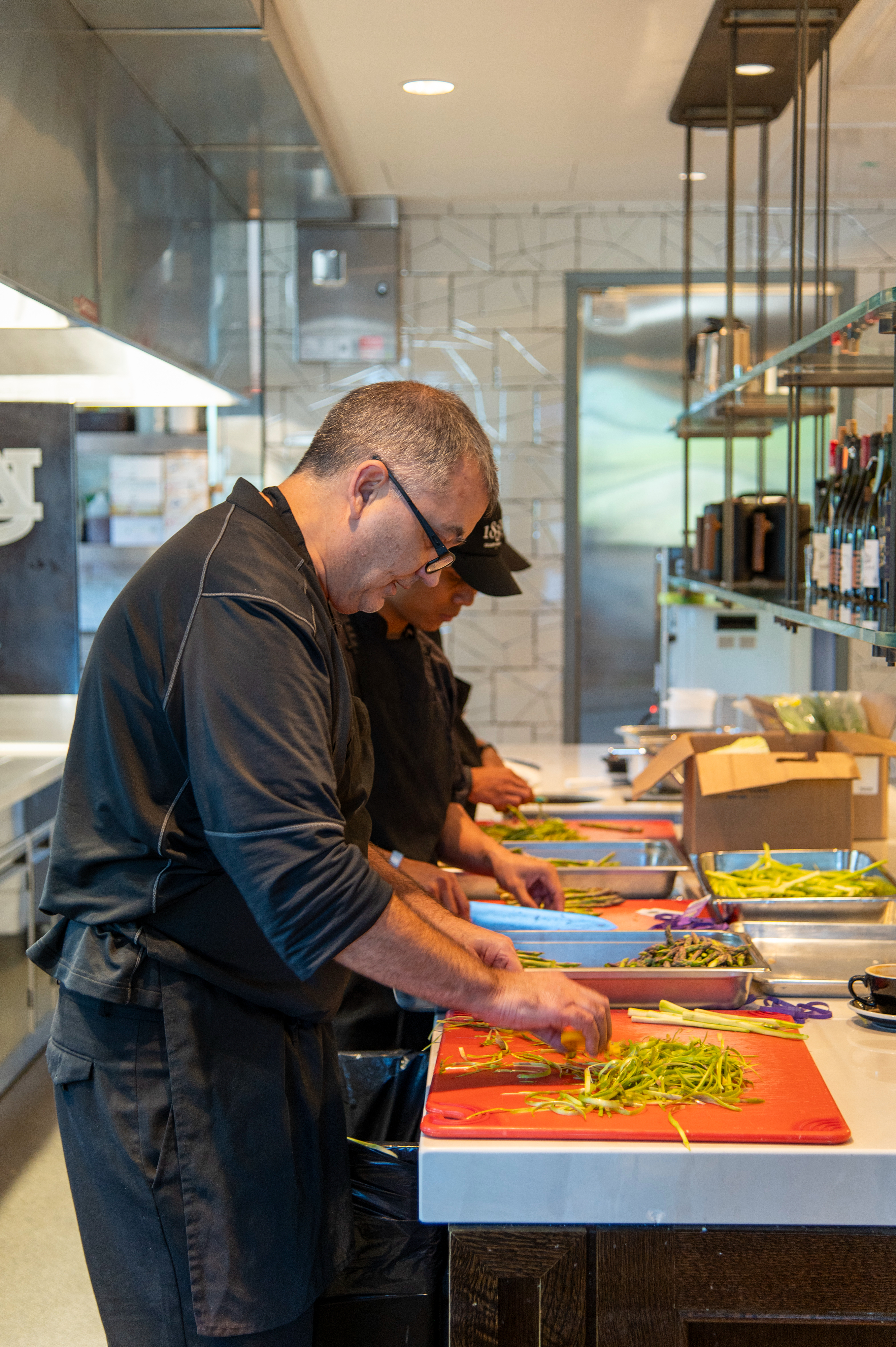 Chef Joel Antunes cutting vegetables