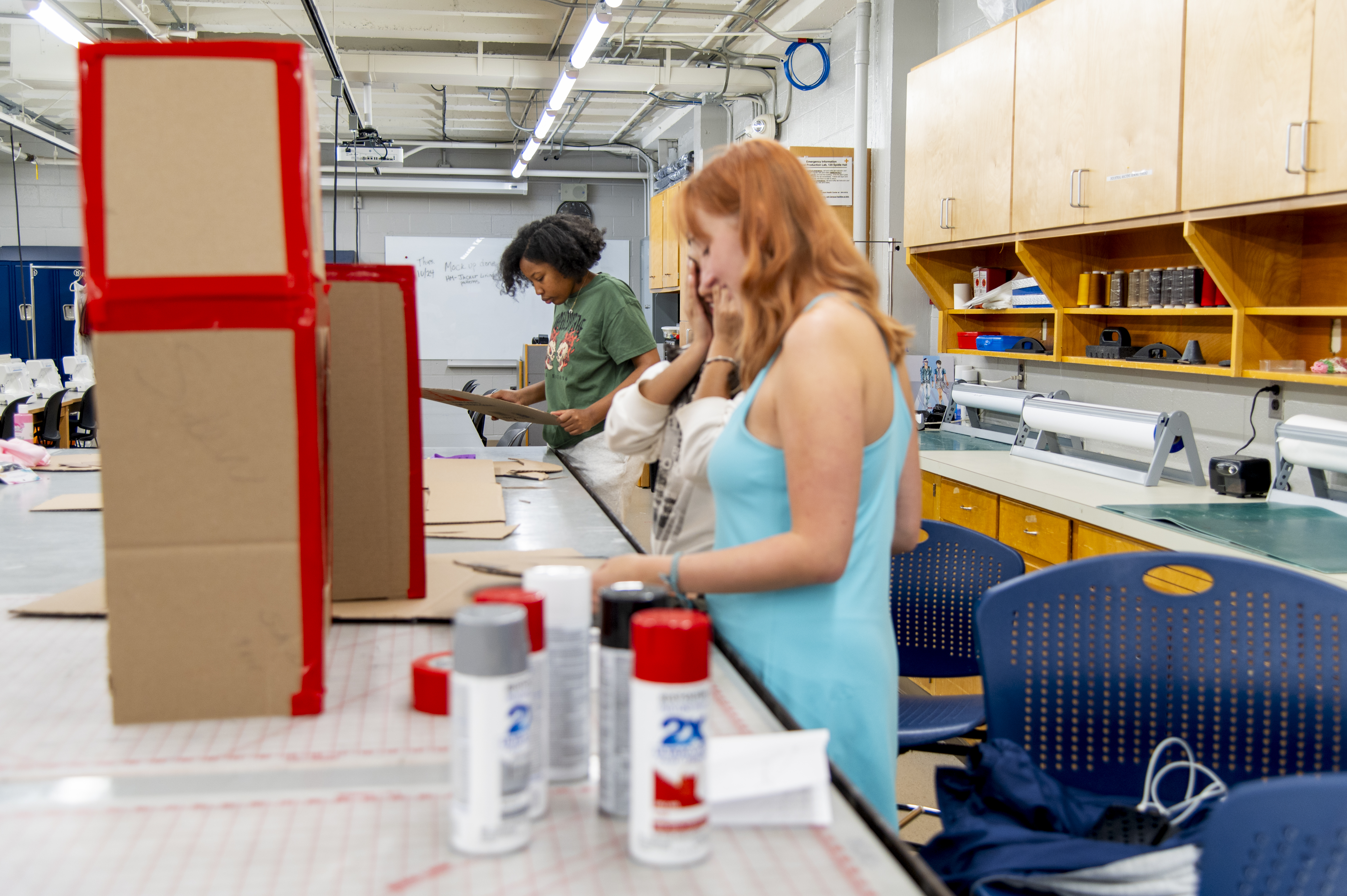 Students prepare to build a costume