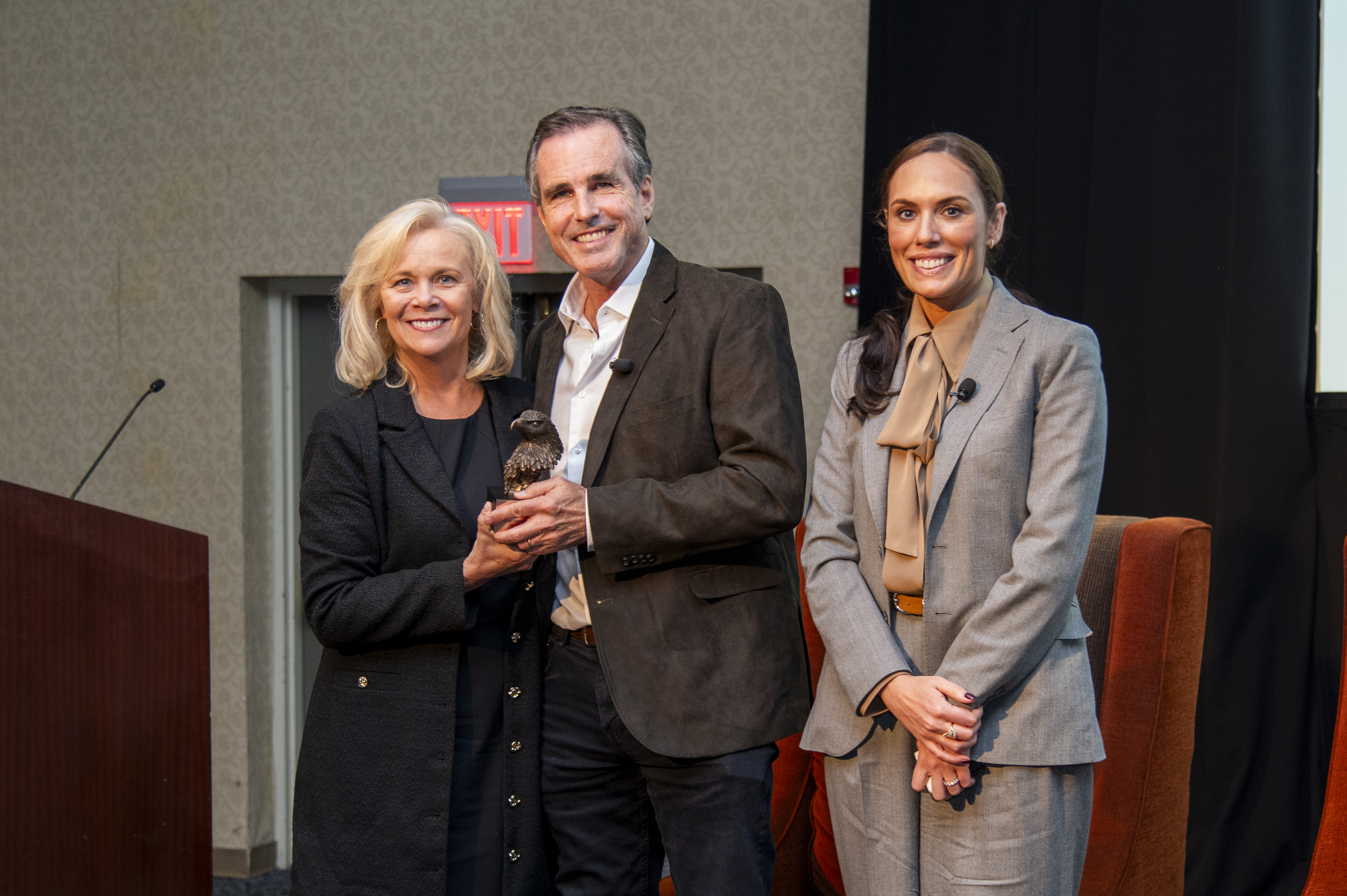 Bob Woodruff is presented with an award from the College of Human Sciences