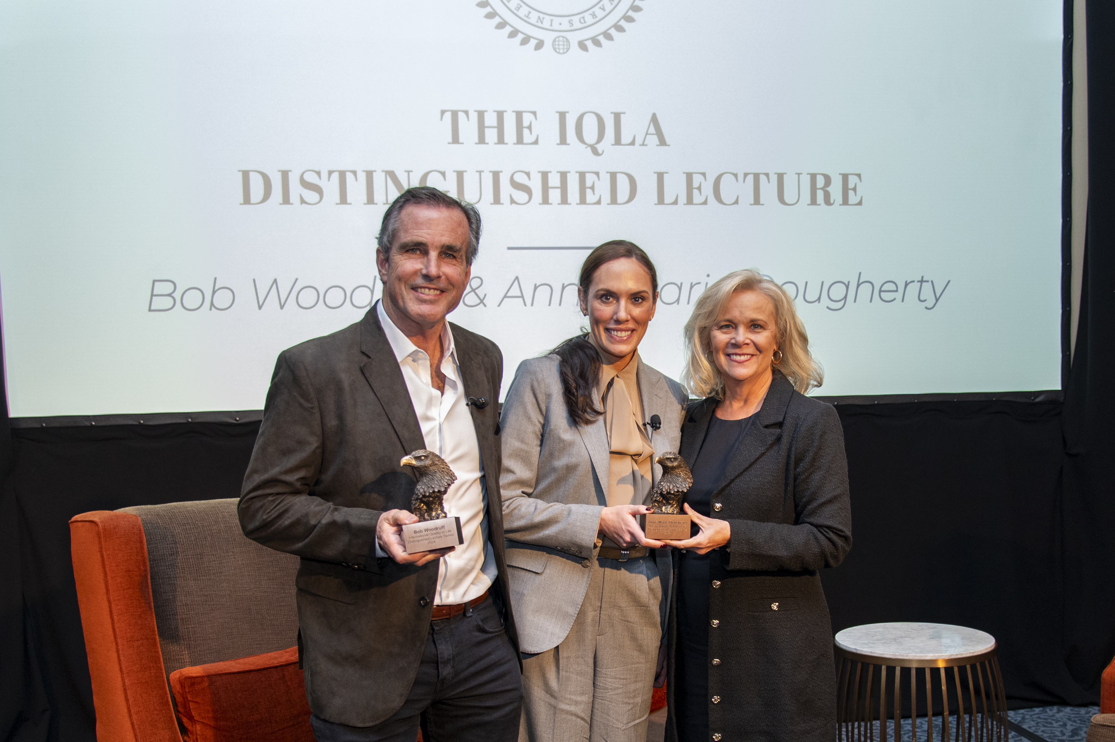 Bob Woodruff and Anne Marie Dougherty are presented with awards from the College of Human Sciences.