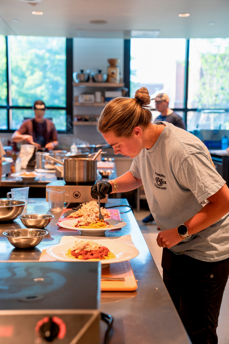 Grace Heery,  who graduated with a bachelor's degree in nutrition dietetics this May, finishes her dish
