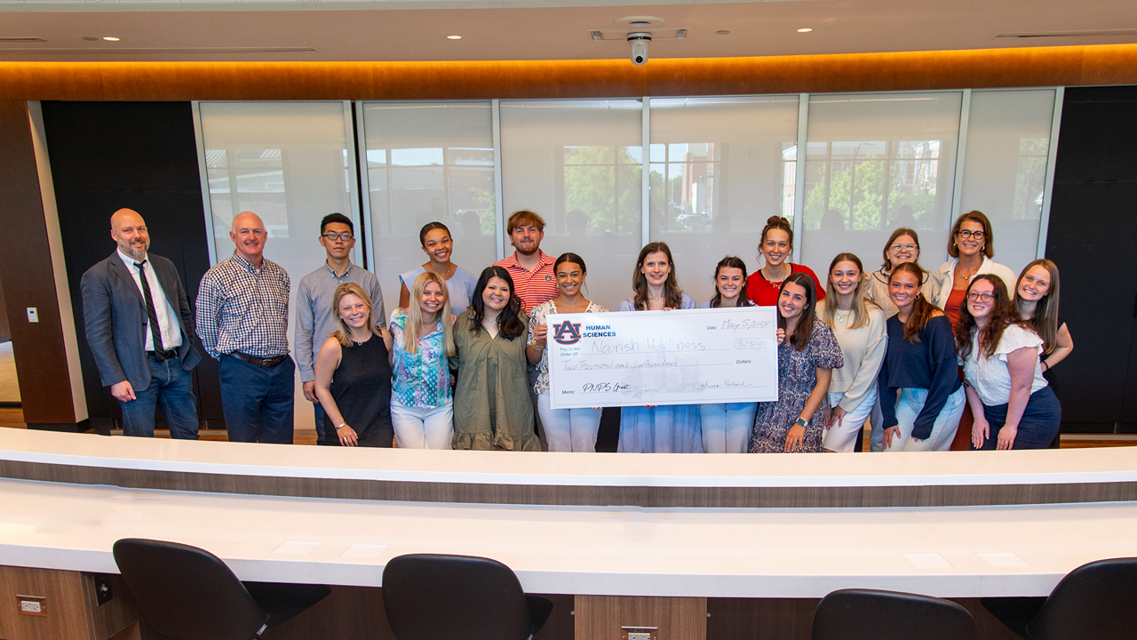 The Grantmaking for Philanthropists class awards a $2,500 check to Nourish Wellness