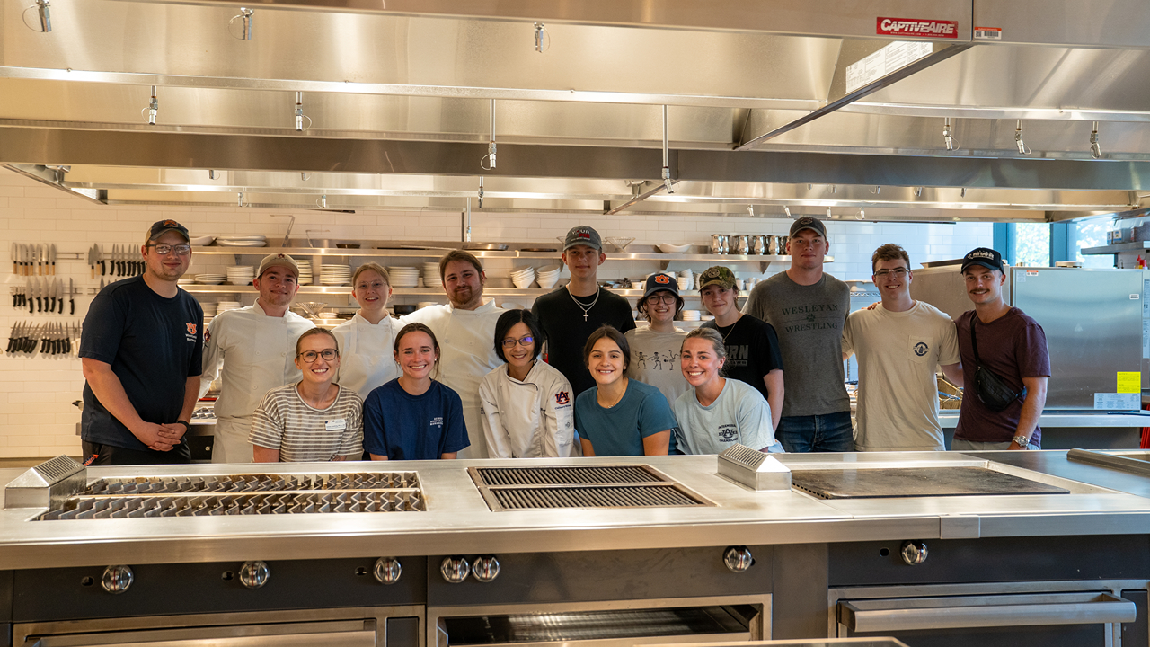 A group photo with all participants in the healthy cooking demonstration
