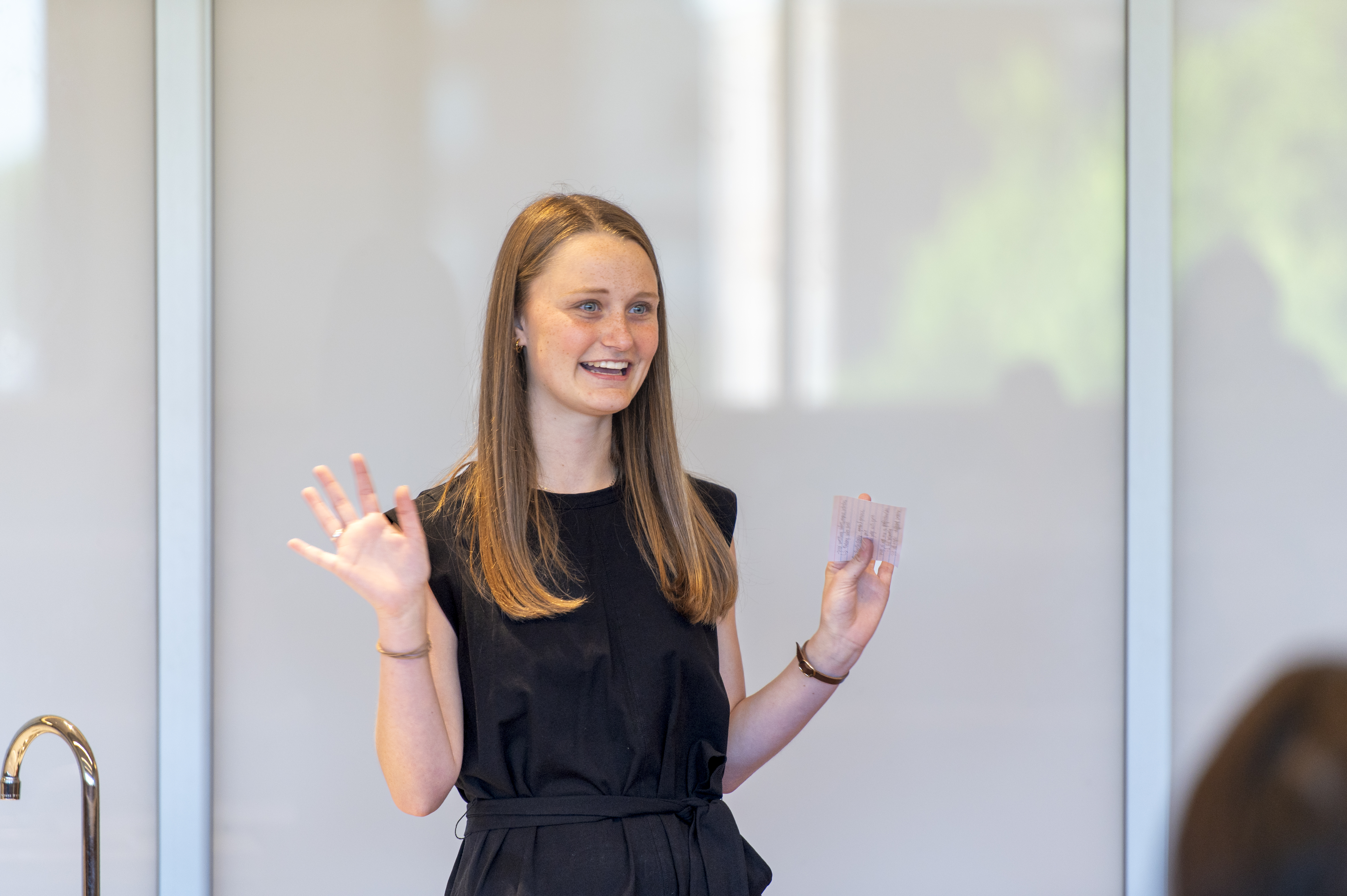 College of Human Sciences students speak during a presentation awarding a $2,500 grant to Nourish Wellness.