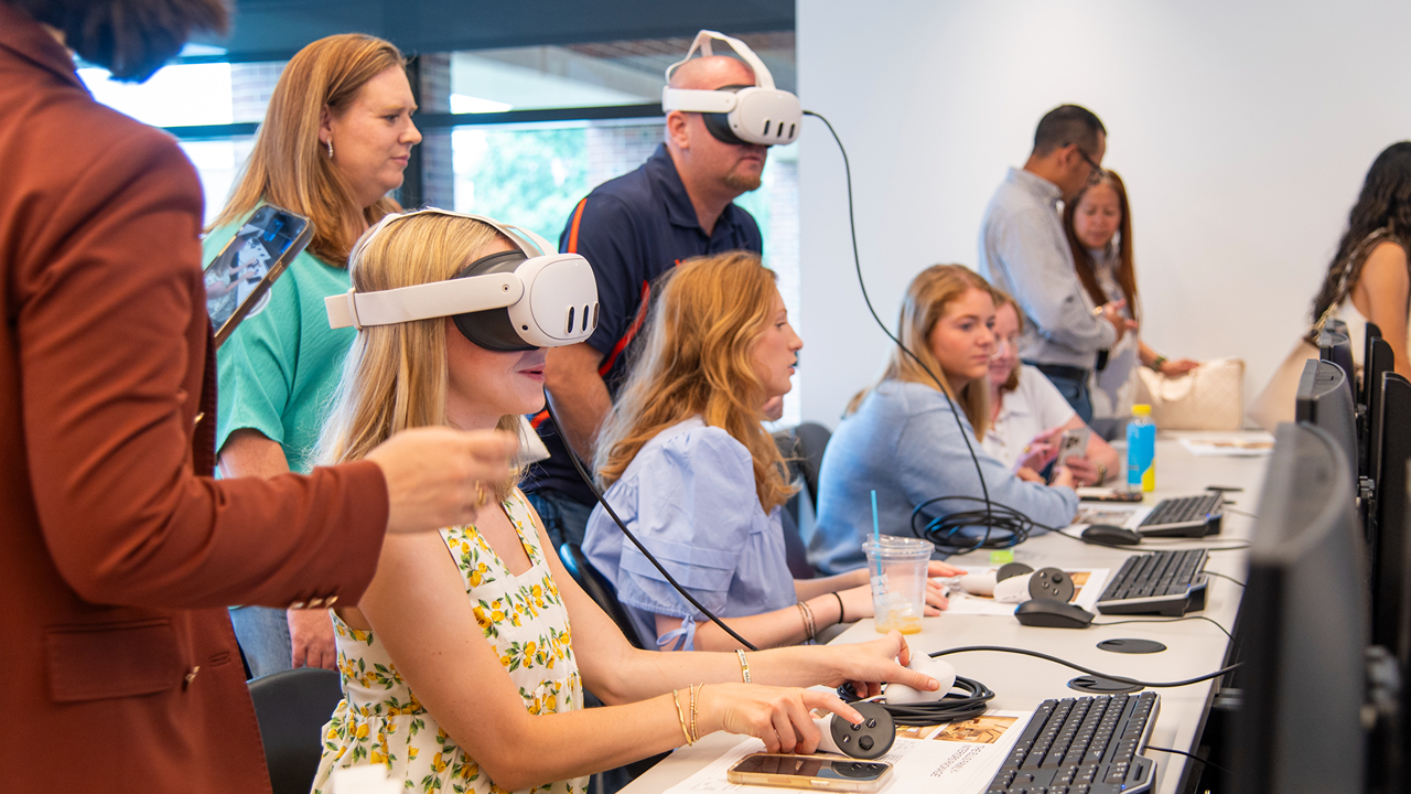 Interior design students work in a computer-aided design course.