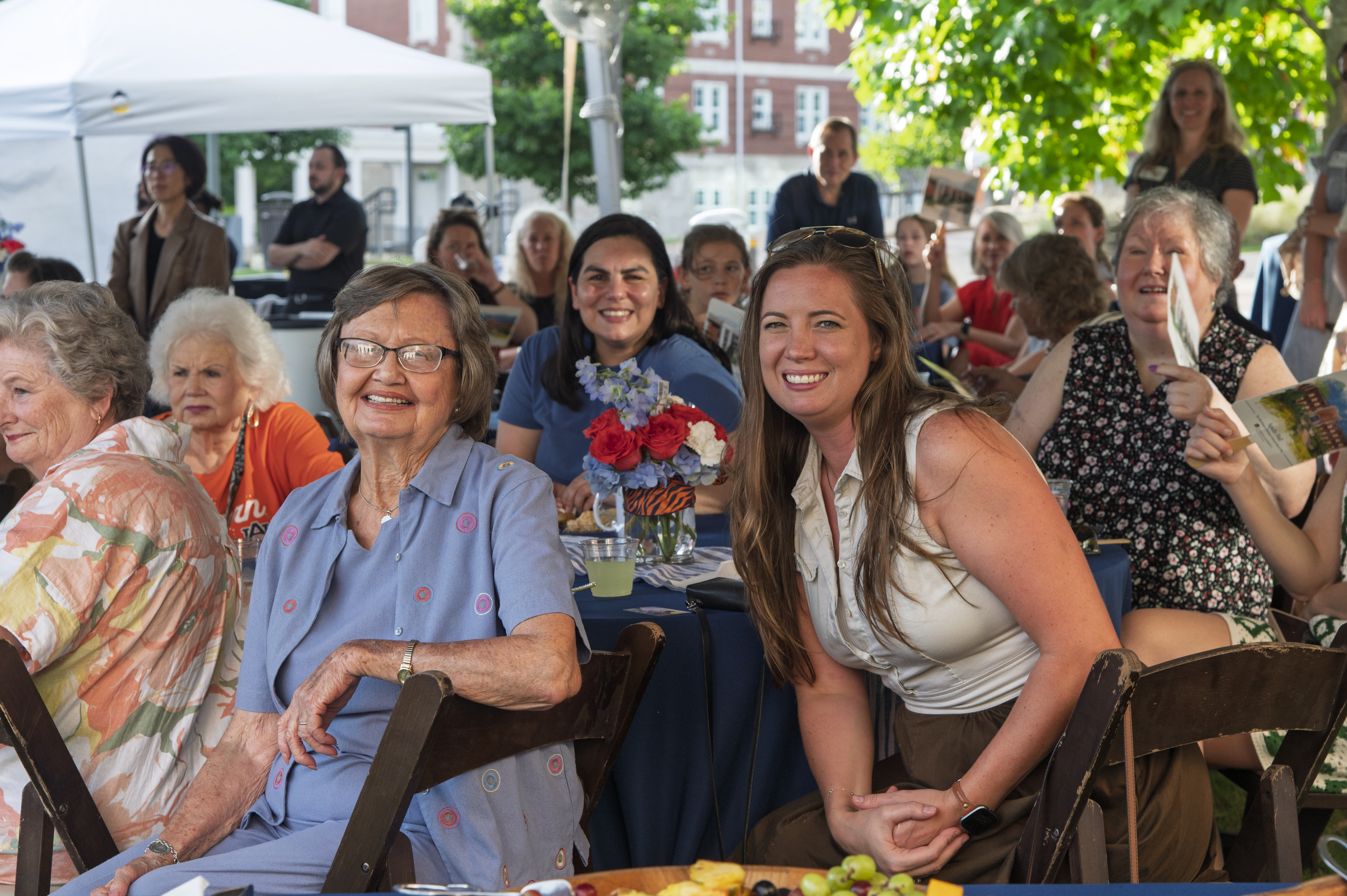 Guests pose for a photo at the Farewell to Spidle event