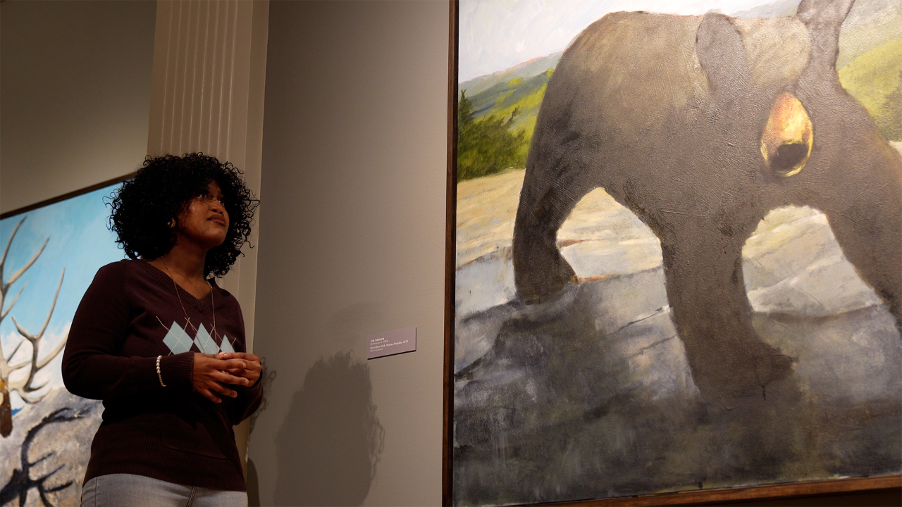 Precious-Roberts Miller conducts a tour at the Jule Collins Smith Museum of Fine Art