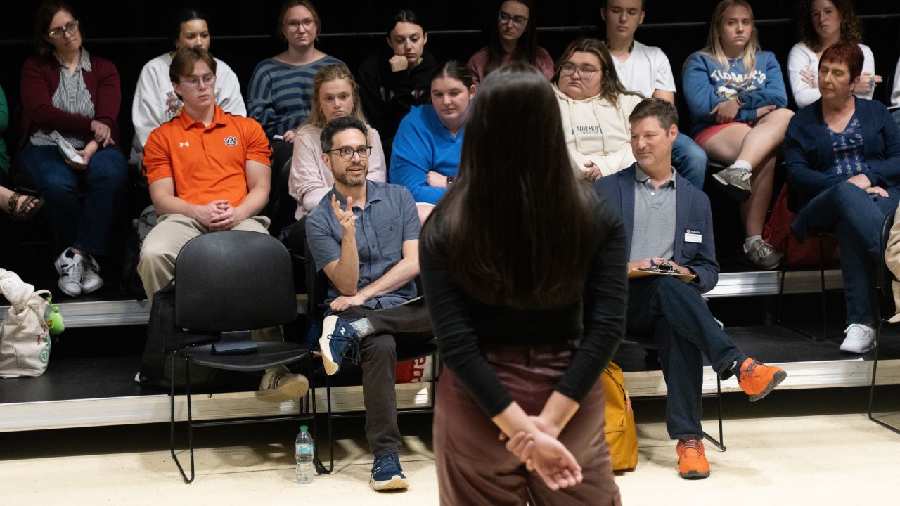Adam Gwon giving feedback on Olivia Beland