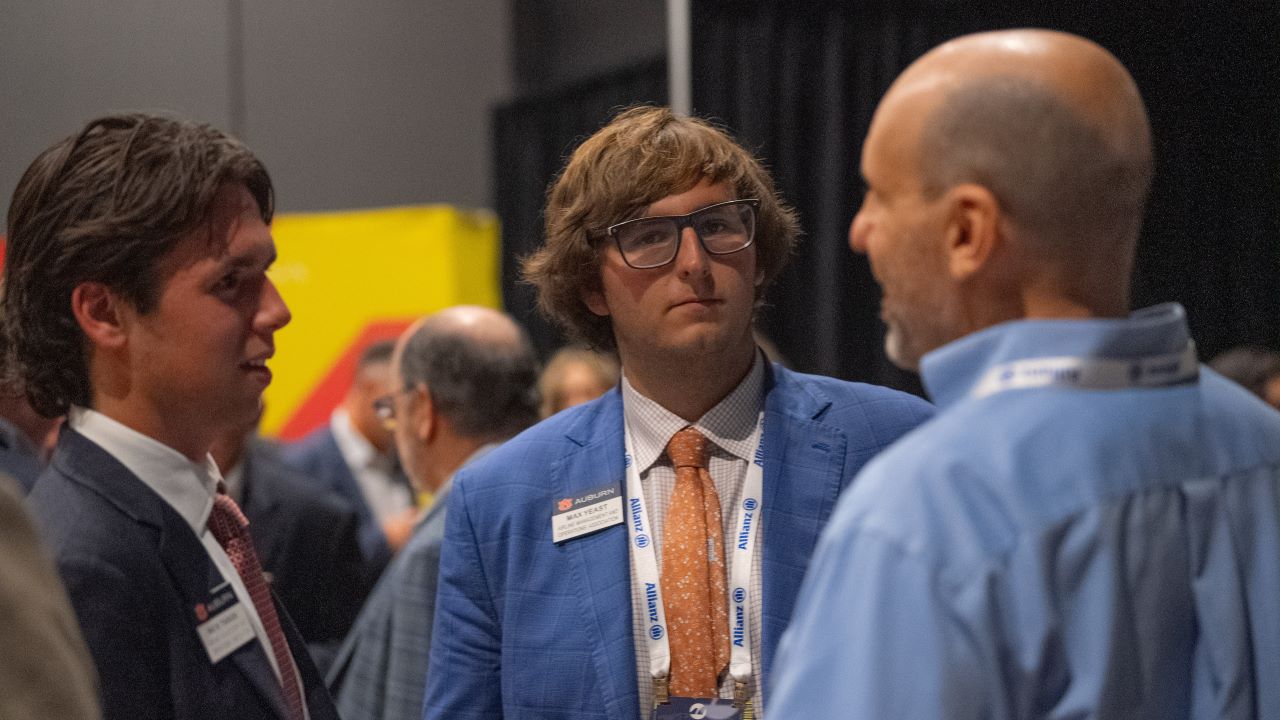 Nicholas Tarasi and Max Yeast speaking with Skift Aviation Forum attendees
