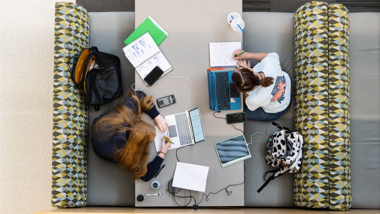 Auburn students using laptops to complete course work