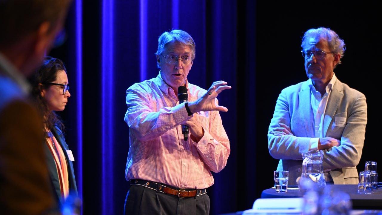 John Morris speaking during a panel at the University of Twente