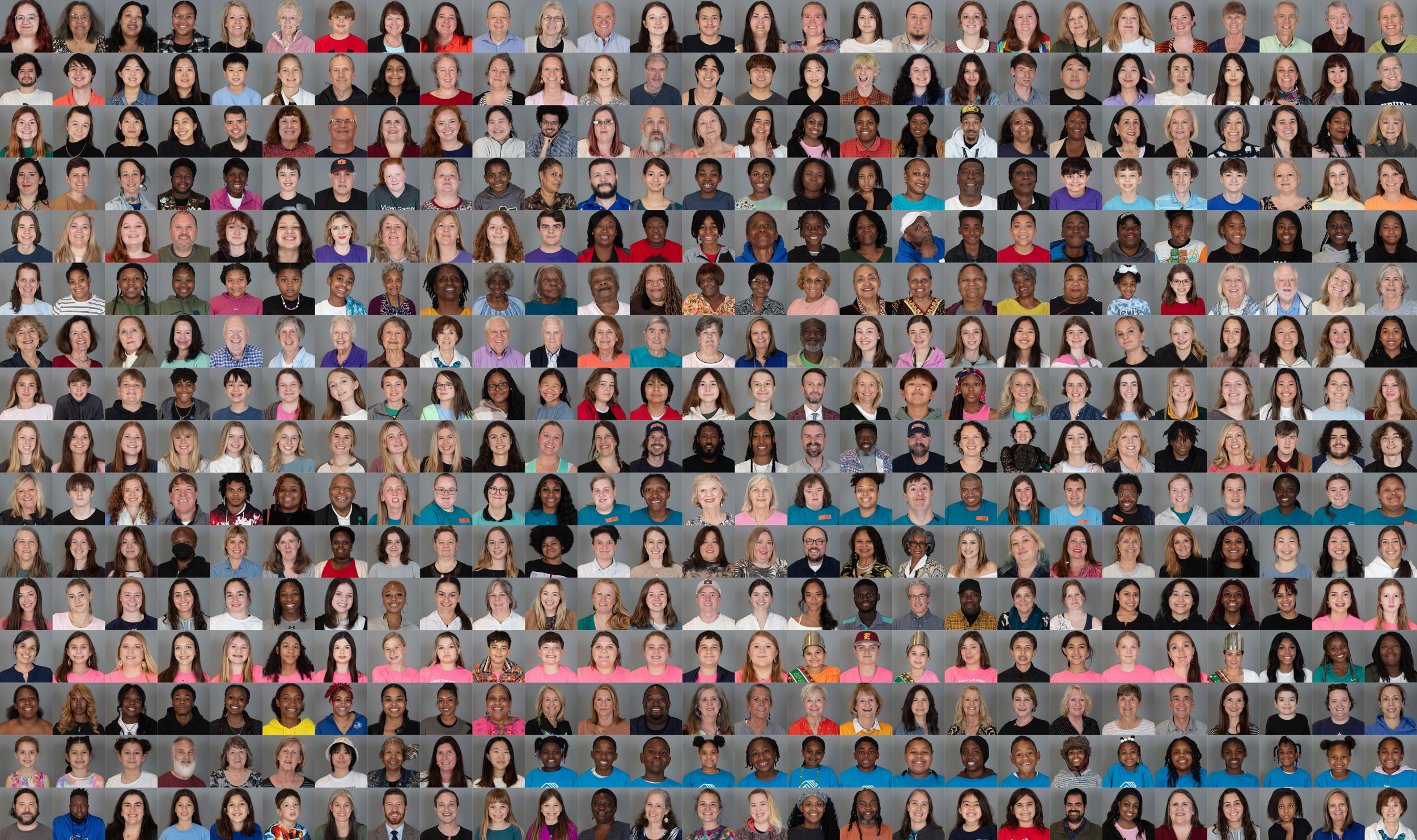 A photo mural of 450-500 people