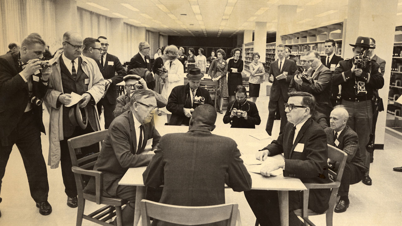 Harold Franklin registering for classes in 1964