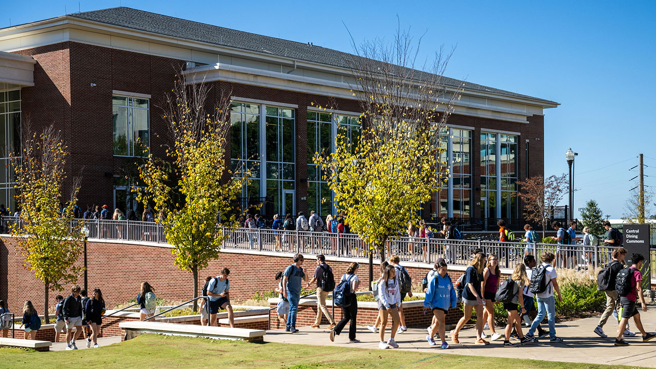 Students are pictured walking on Auburn's campus