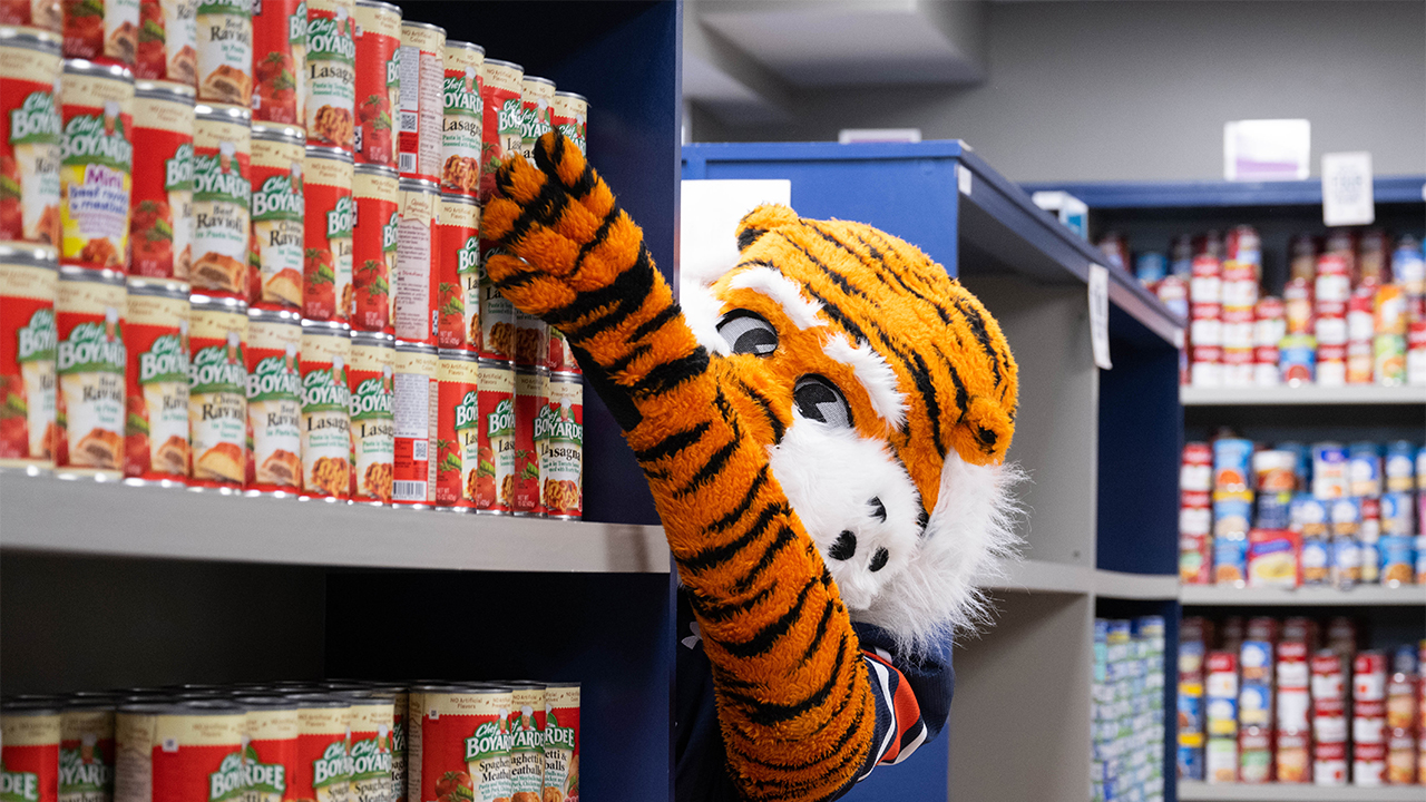 Aubie at the Auburn Campus Food Pantry