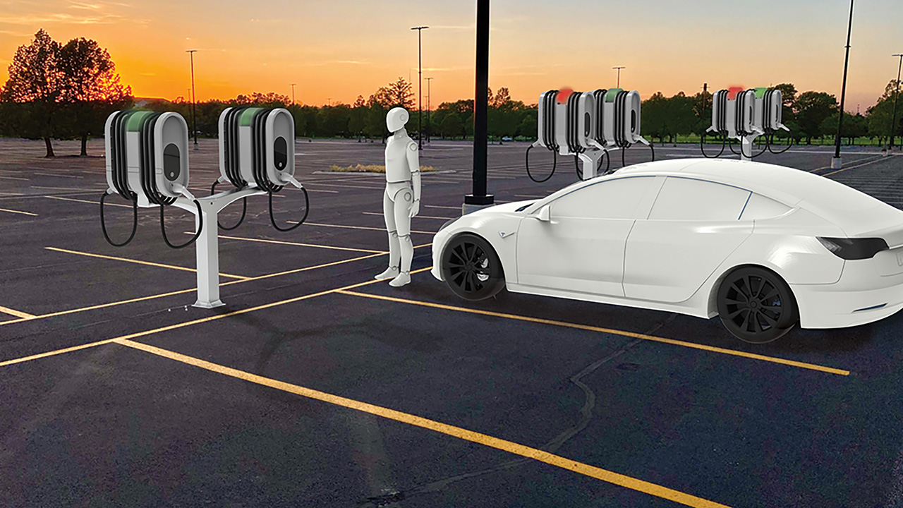 A parking lot with a sunset behind it has electric vehicle charging stations