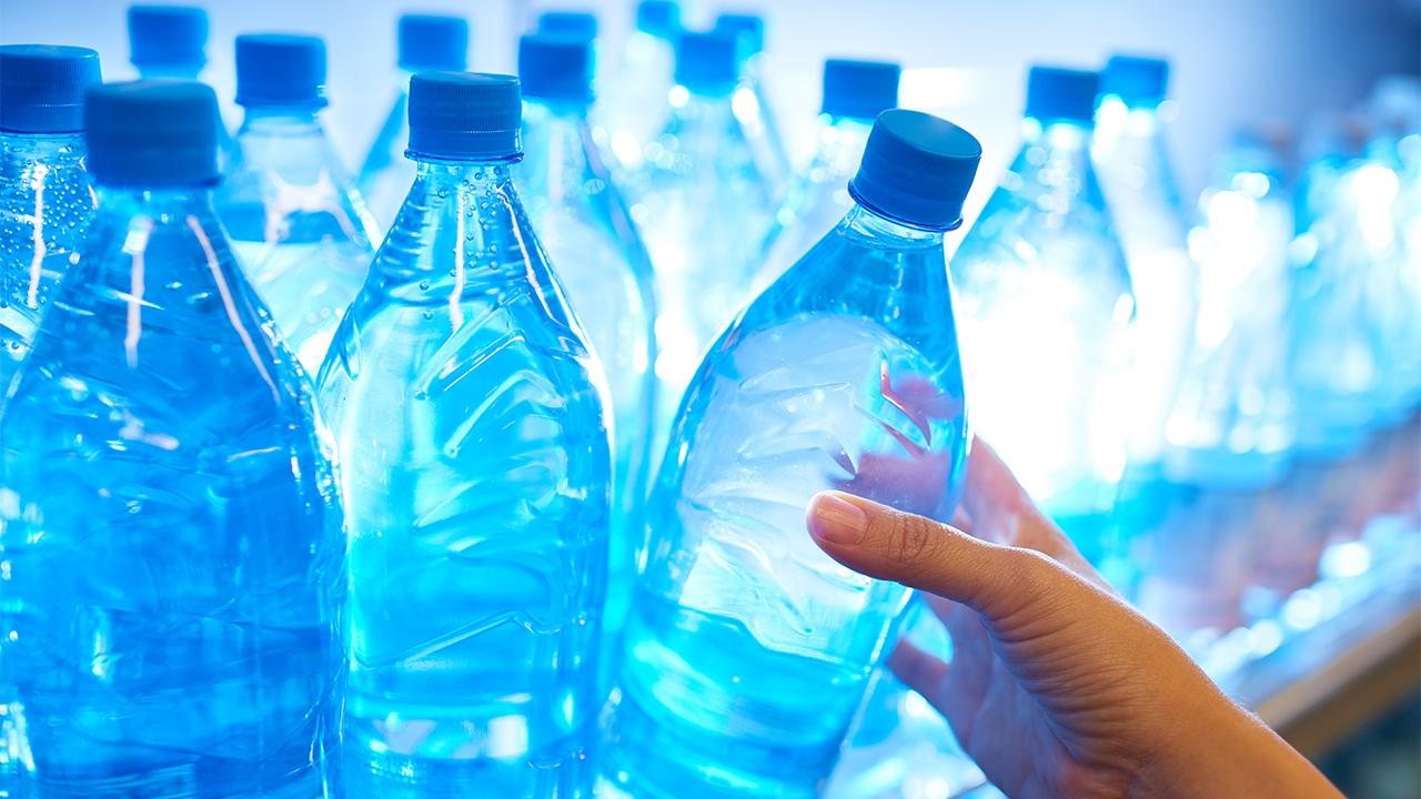 A close-up image of plastic water bottles.