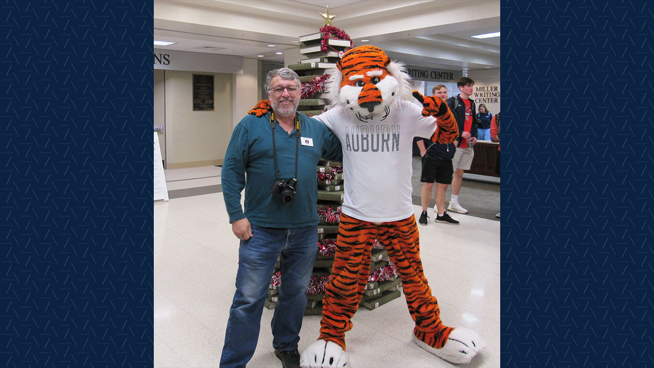 Jayson Hill with Auburn mascot Aubie