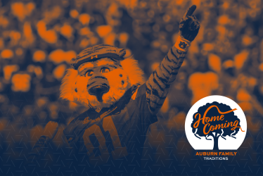 Aubie the Tiger in a navy graphic holding up a number one.