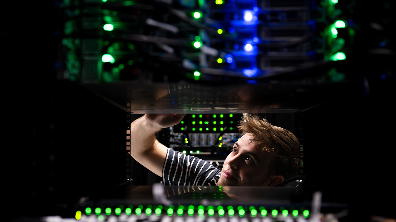 a student working in a server room