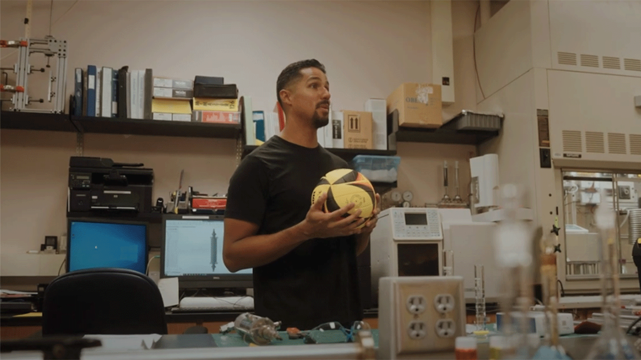 Felix Mendoza-Suarez stands in his lab.