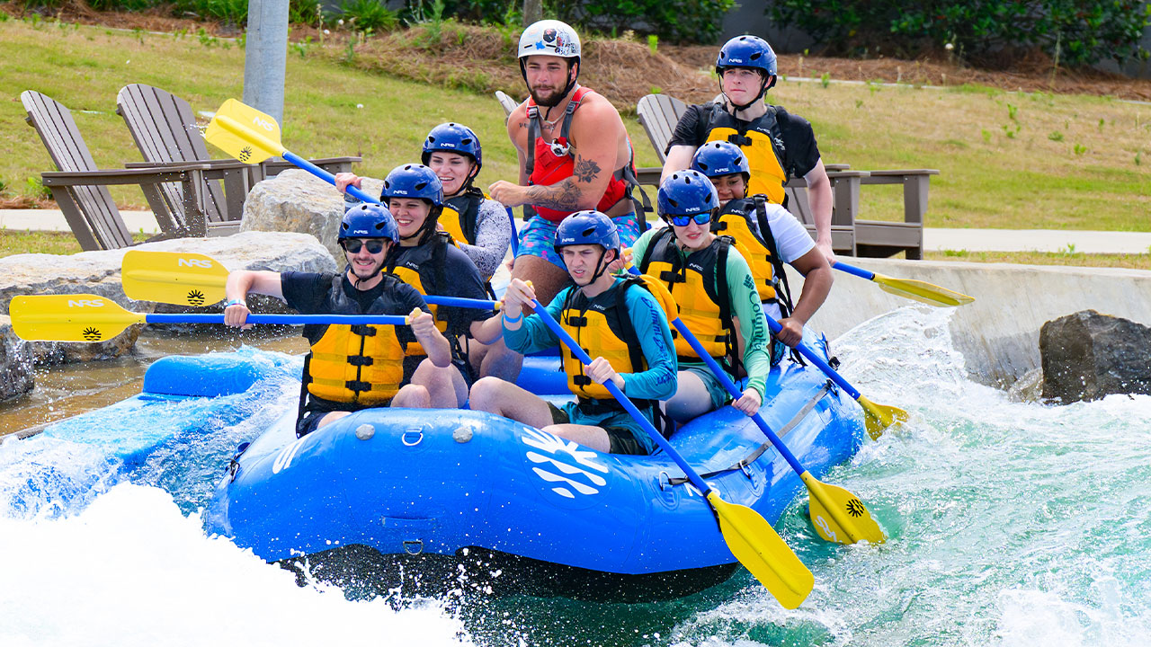 students whitewater rafting