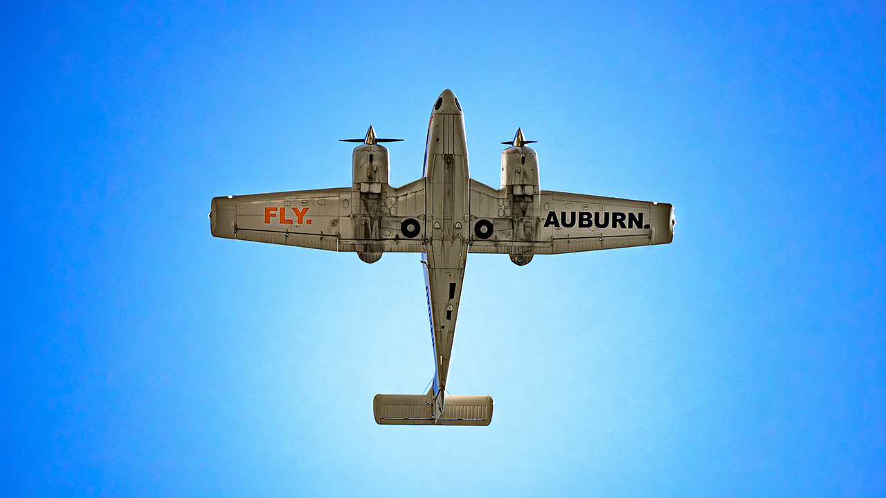 An airplane in a blue sky