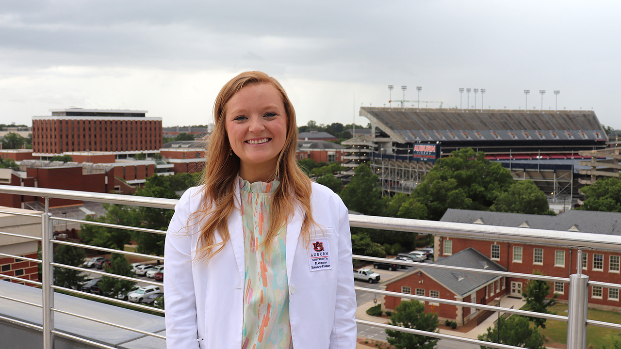 Mary Layton Lancaster stands on top of Horton-Hardgrave Hall