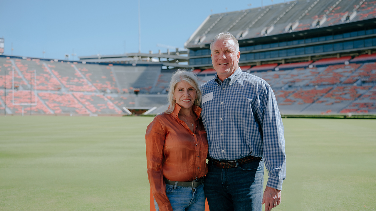 Suzanne and Glenn Morris in Jordan-Hare stadium